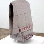 Christina Shmigel,  Hats for the Contemporary Literati: Hat for Cutting Thru Delusion (True/False), calligrapher's felt, wire and glass, 63 x 15 x 12 cm,  2012  