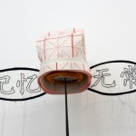 Christina Shmigel,  Hats for the Contemporary Literati: Hat for Cutting Thru Delusion (True/False), calligrapher's felt, wire and glass, 63 x 15 x 12 cm,  2012  