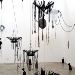 Ed Pien and Karin van Dam, "Suspended Gravity," mixed media installation, acrylic, wool, sand bags, boat fenders, Chinese umbrellas, gear shift boot, styrofoam, plastic ties, embroidery rings, string, dimensions variable, 2013 