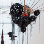 Ed Pien and Karin van Dam, "Suspended Gravity," multimedia installation, acrylic, wool, sand bags, boat fenders, Chinese umbrellas, gear shift boot, styrofoam, plastic ties, embroidery rings, string, dimensions variable, 2013 